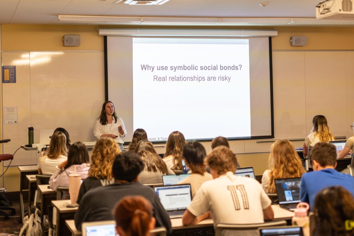 Pitt students sit in a classroom during a lecture.
