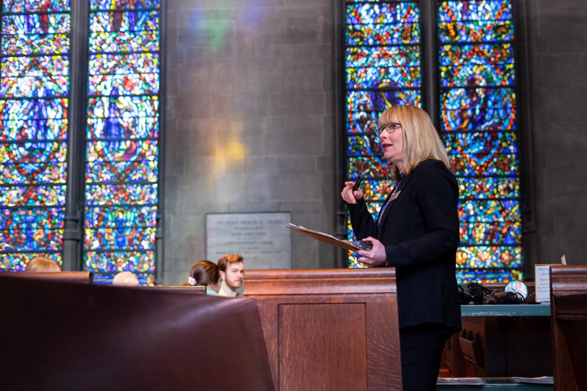 Heinz Chapel docent Karen Sebolt guides participants during the 2025 Heinz Chapel “Women in the Windows” tour.
